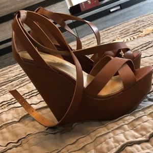 Brown strap up wedges